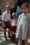 Kids dressed in typical best clothes