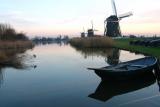 Three mills with rowing boat