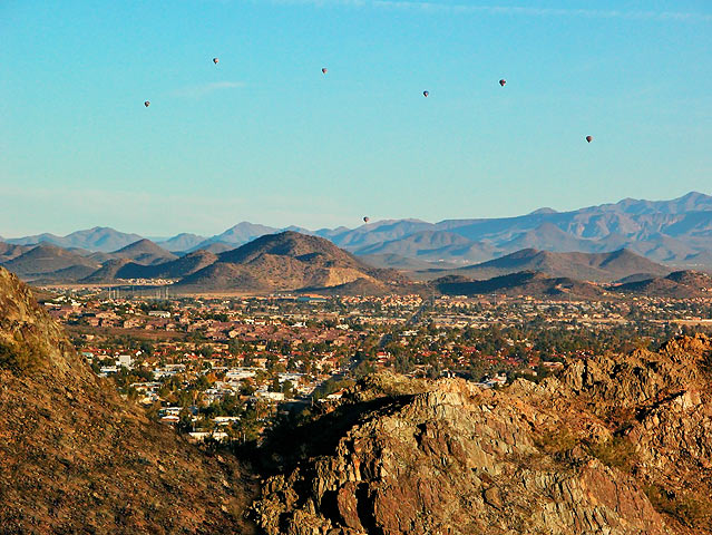 Balloons over city