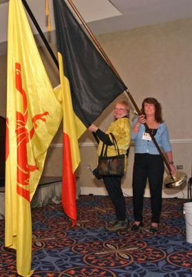 Jamie Langlie and Janet Crowe with Belgian flags
