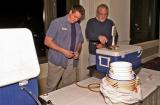 BURPers Steve Marler and Mel Thompson prepare taps for Friday nights reception featuring homebrewed Belgian style beers.