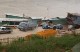 Unloading Beer Lao at Luang Prabang slow boat port.