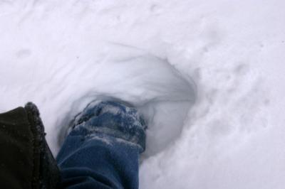 There's a boot under the snow too.