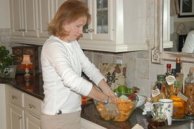 Terrie mixing the sweet potato fries