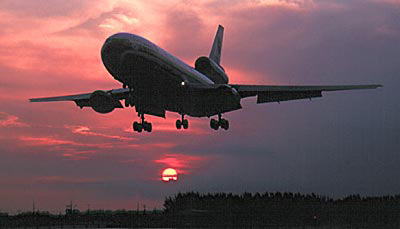 DC10 landing sunset aviation stock photo #SS9915L