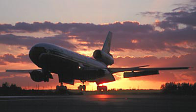 DC10 landing sunset aviation stock photo #SS9921