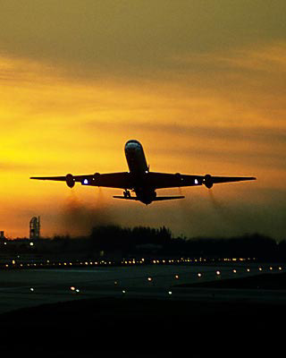 DC8 takeoff sunset aviation stock photo #SS0107p