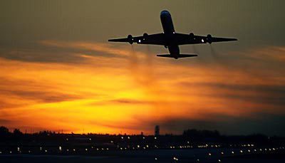 DC8 takeoff sunset aviation stock photo #SS0108