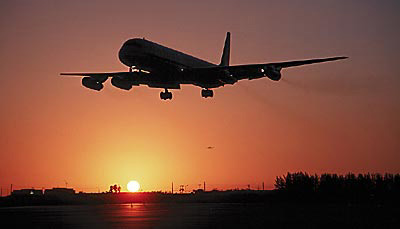 DC8 landing sunset aviation stock photo #SS9903