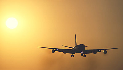 DC8 landing sunset aviation stock photo #SS9938