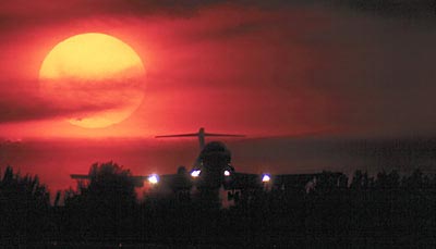 B727 landing sunset aviation stock photo #SS9708