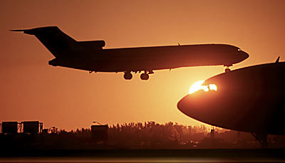 B727 landing sunset aviation stock photo #SS9701