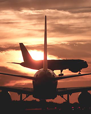 2 B757's sunset aviation stock photo #SS9911p