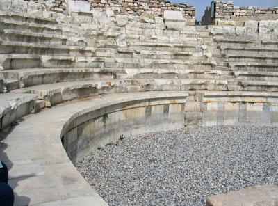 Seating for ~1750.  The marble on lower portion, with large seats on top row, stayed intact 
unlike most stone theater seating we've seen.