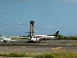 Aloha to AQ241 bound for LIH; WP & Airpine Air wait their turn for take off.