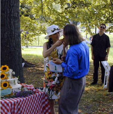 The bride feeds the groom ....