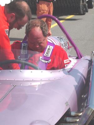 Commentator Paul Page taking a Indy Roadster out for a spin.