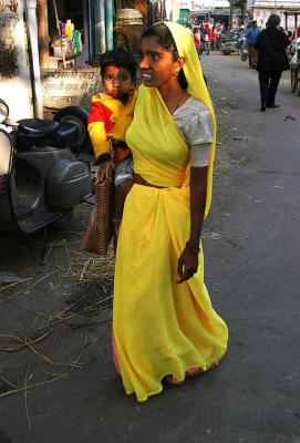 Woman in yellow Udaipur.jpg
