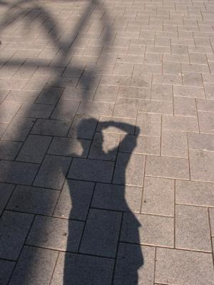 Next to the chalice's shadow