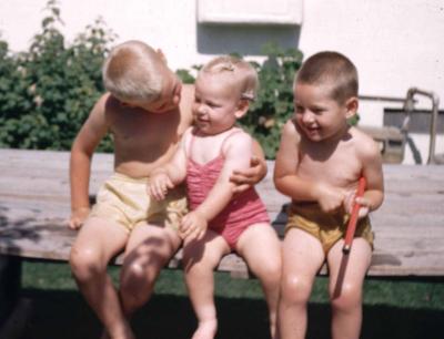 Three Kids On Table