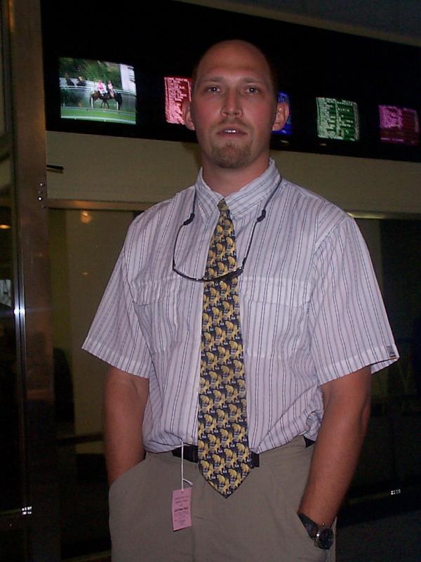 Poor Dave, he had to wear a shirt & tie for the horse races.  Not a happy man!