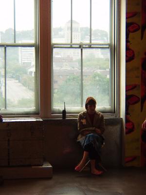 A guard takes a break (window, Warhol Museum)