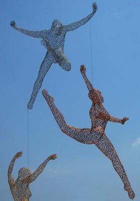 Three Flying (or Falling?) Figures