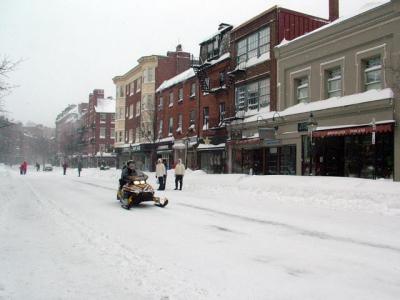 Snowmobiling down Charles Street