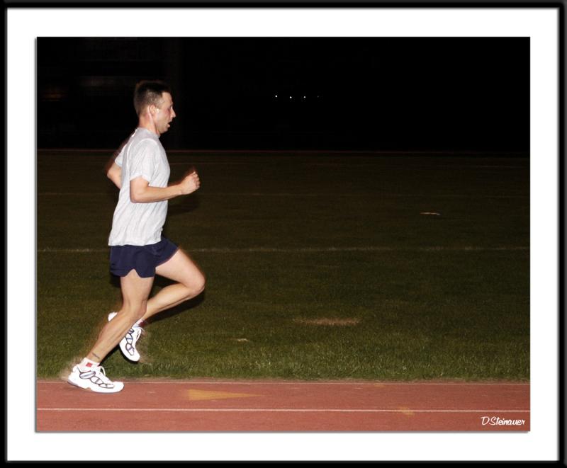 4/13/05 - Track Workout <br><font size=3>ds20050413_0099awF Stride.jpg</font>