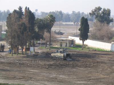 A tank and the wall at Mosul Base.jpg