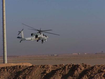 Chopper taking off in Mosul.jpg