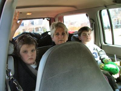 On the way to the airport!  Nonna and the kids crammed in the back.
