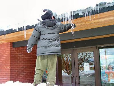 Lots of snow.  Grabbing icicles directly off the roof edge.