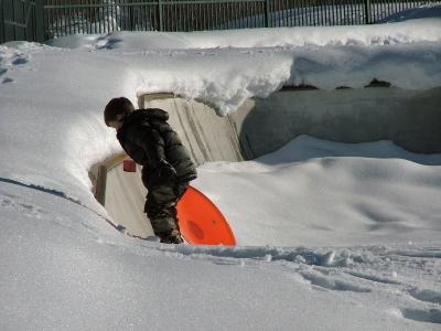 Daredevil sledding at the skatepark!