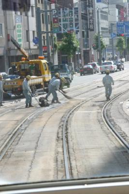 Street work in Hiroshima (notice the brooms)