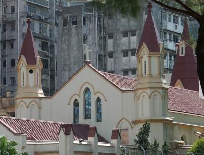 a church in the middle of a concrete jungle
