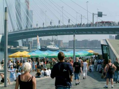 Erasmus bridge in its full glory, now serving as a decorum for the Parade, In front terrace of xafe restaurant 'Prachtig', recently opened, having one of the most scenic terraces in Rotterdam