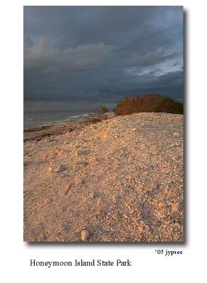 dune and clouds. at sunset