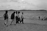 Indian Men Strolling on Beach