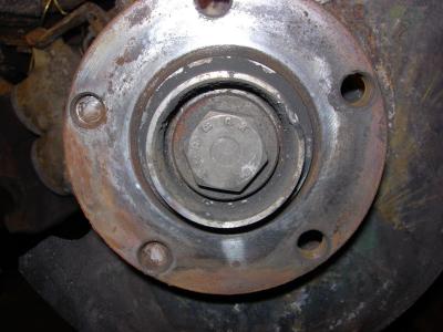 Hub with broken bolt ends.jpg