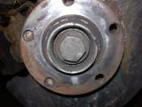Hub with broken bolt ends.jpg