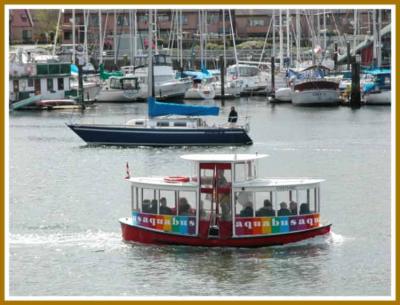 Aquabus - passenger ferry crosses False Creek.