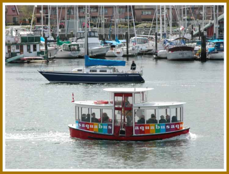 Aquabus - passenger ferry crosses False Creek.