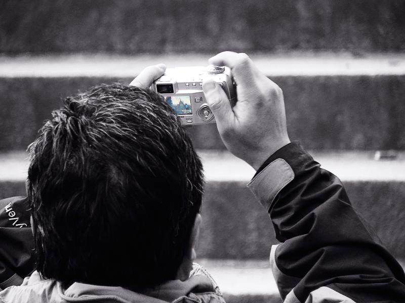 Tourist taking a Picture of Cologne Cathedral
