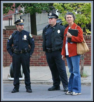 Police and Volunteer Waiting for the Action