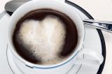 Foam heart on coffee with spoon.jpg