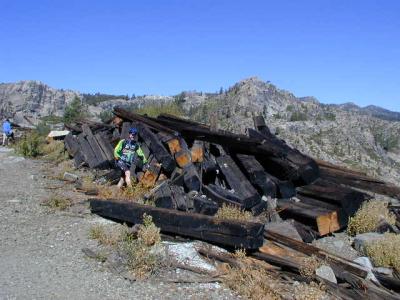 It's been many years since the wooden snowsheds, which at one time covered forty miles of the Donner Line, were replaced with concrete sheds, and then only in the critical areas.  Yet piles of timbers from the demolished wooden sheds still line the right-of-way today.  If only those wooden beams could tell stories!