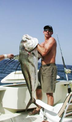 Andy's huge tough fighting roosterfish, Pias Bay, Panama 1-2003