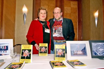 Guido Deboeck with wife Hennie and copies of his popular Belgian beer cookbook.