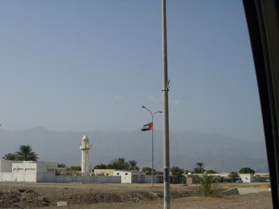 Emirates flag, mountains, minaret